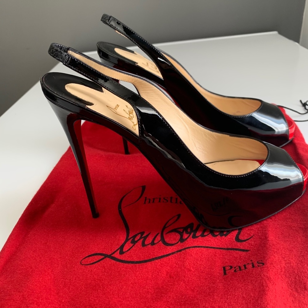 Christian Louboutin pumps and one dust bag
